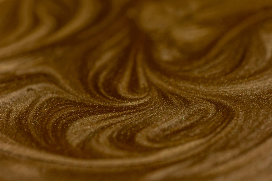 The Uncomfortable Story Behind the Shimmer in Your Sunscreen, Lip Balm & Body Cream.